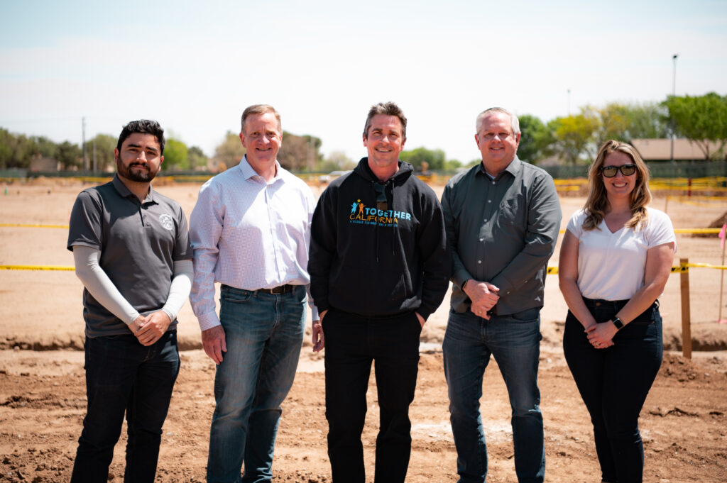 Photo of the Morley Team with Christian Bale and Dan Stafford